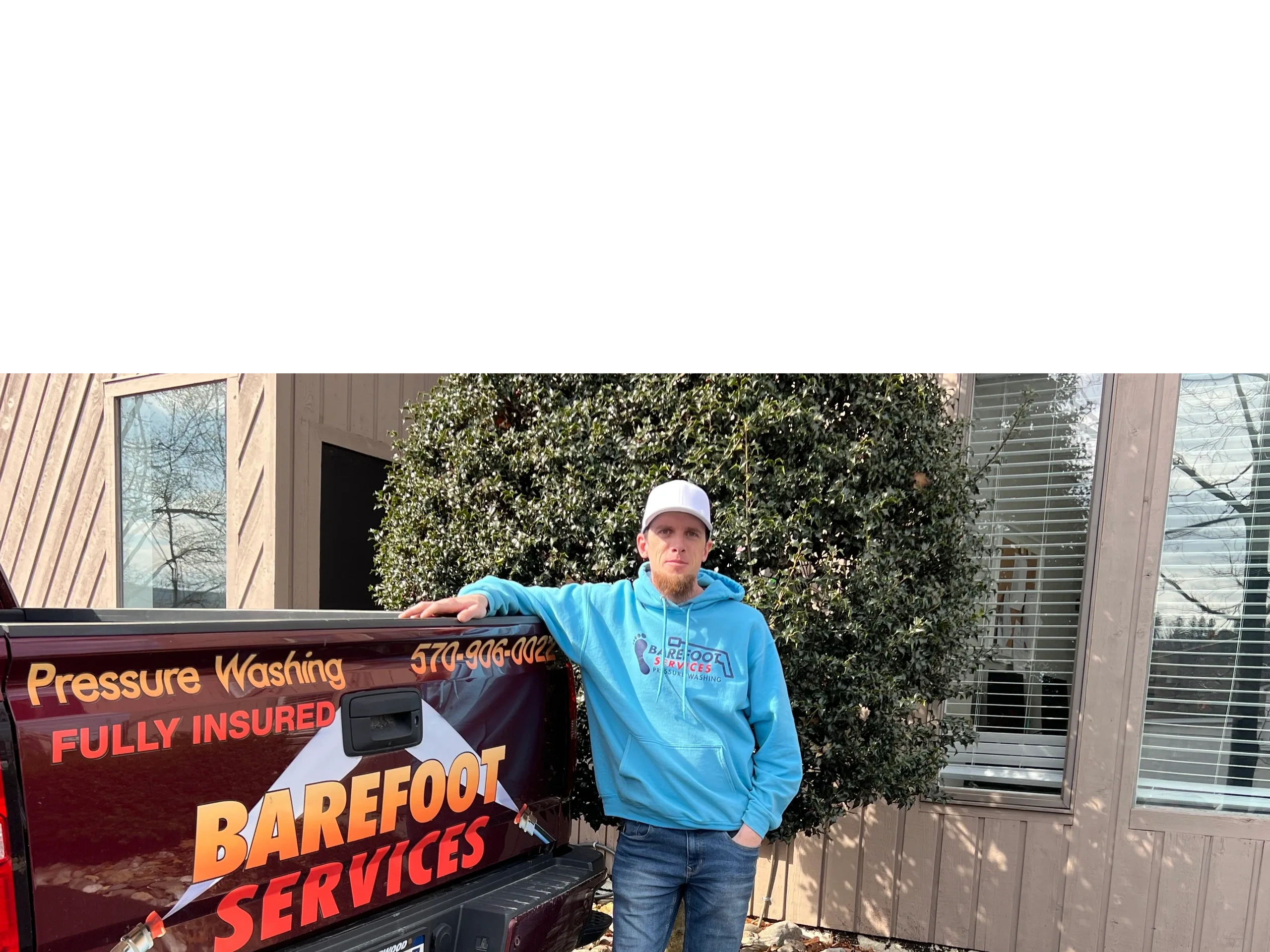 John Butler with Barefoot Services truck — Pressure Washing, Fully Insured